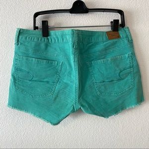 Teal corduroy shorts with rough edge
